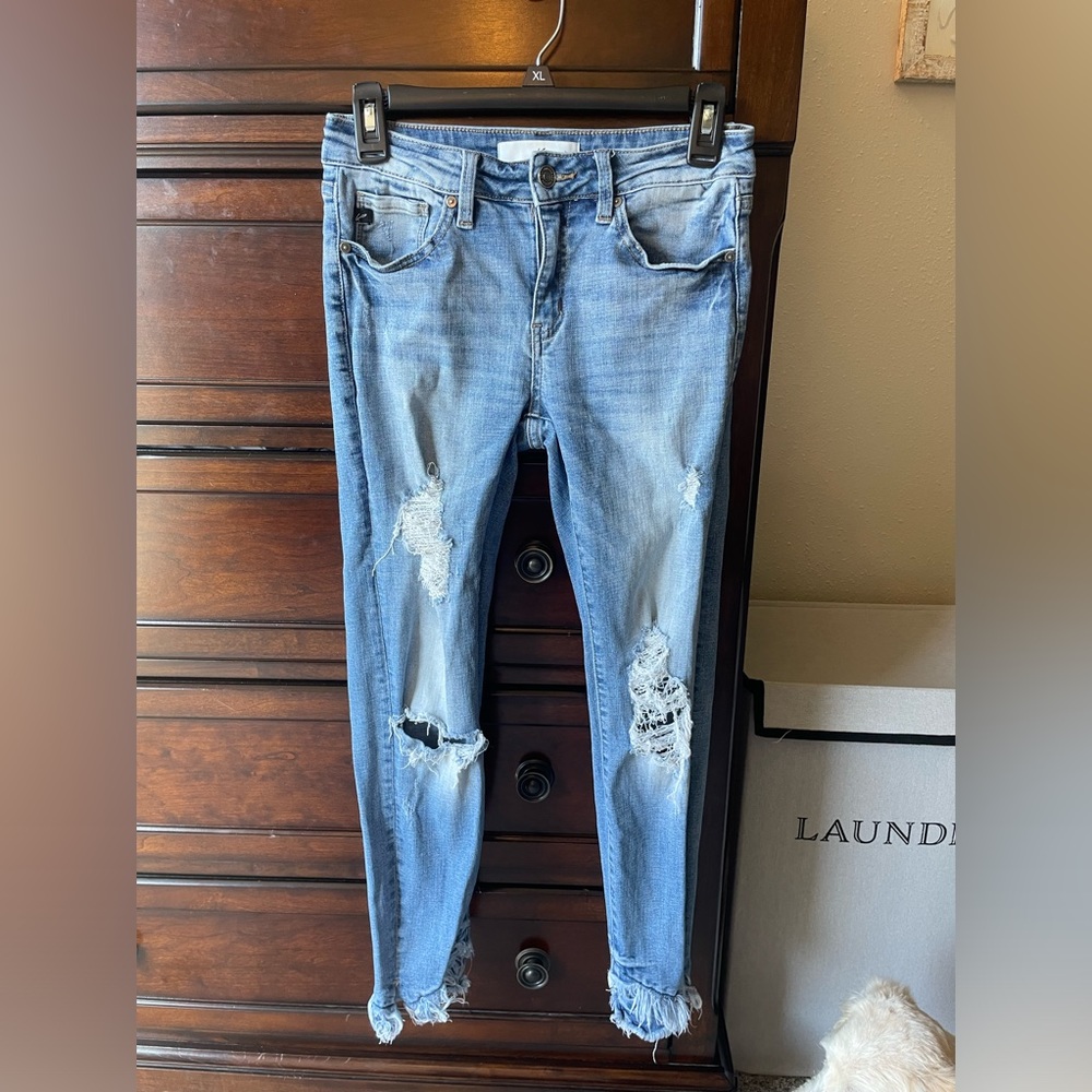 Size 5 mid rise light wash destroyed KanCan jeans.